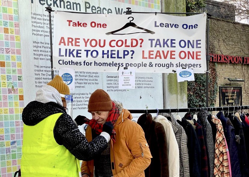 A recipient of warm clothing at a TOLO rail